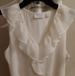 White sleeveless blouse